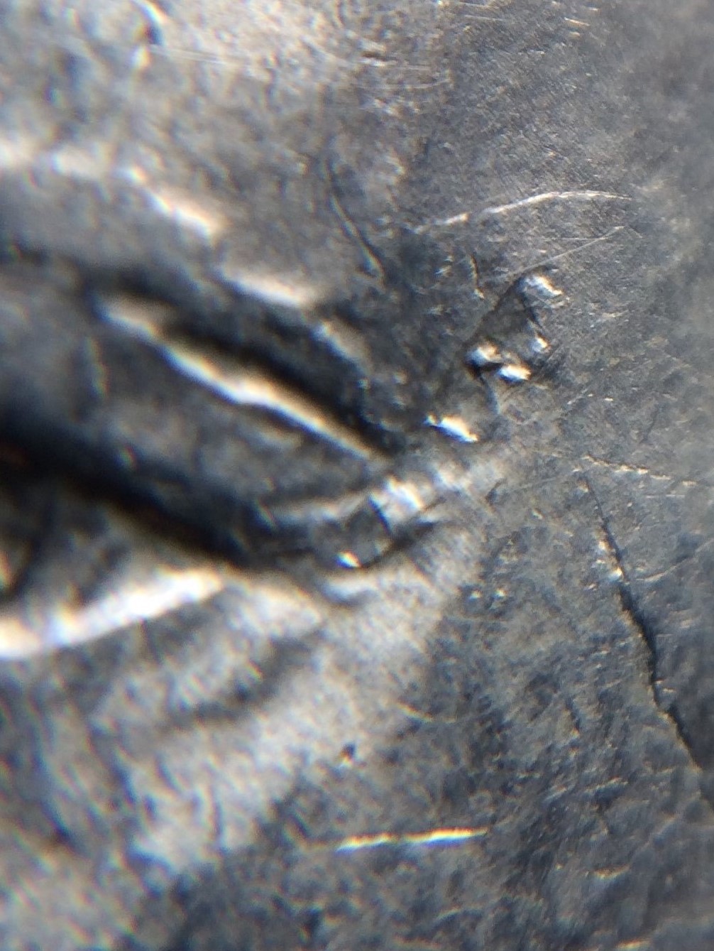 1974-Dollar-Corkscrew-Like-Imprint-On-Two-Coins-Different-Locations